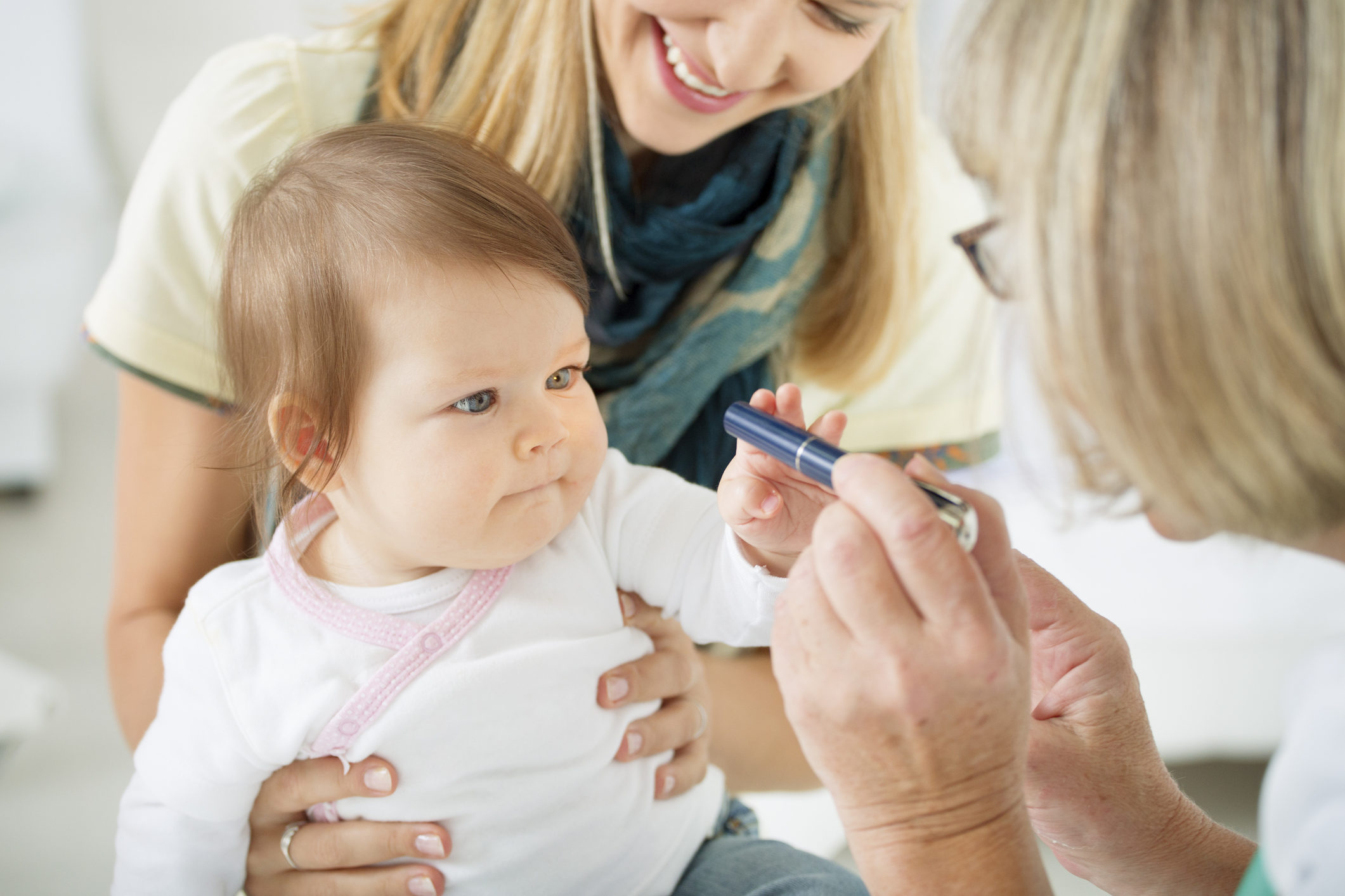 Pediatrician Checking Eyesight of an baby girl.