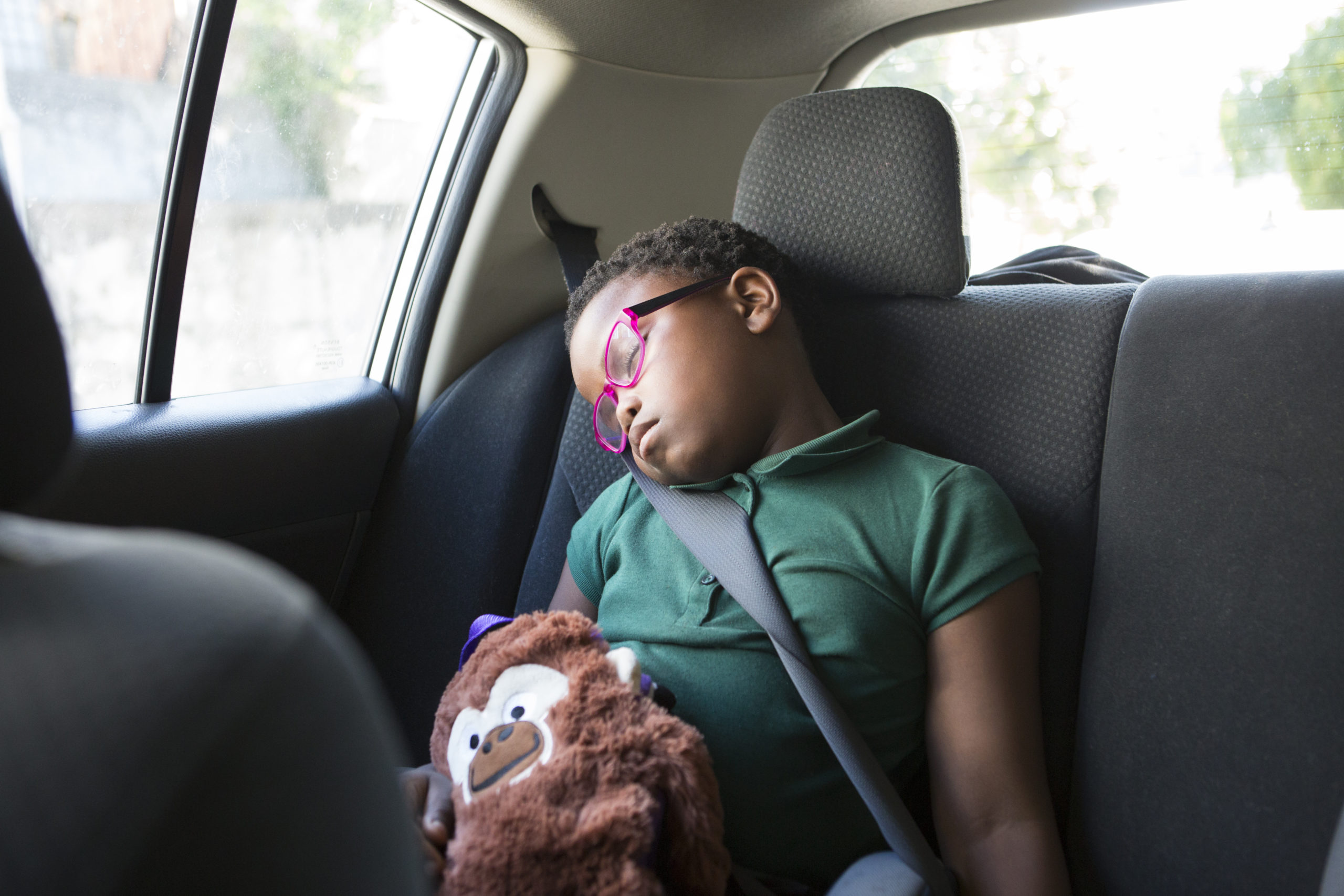 Girl sleeping in car