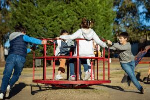 An image of kids playing on a playground