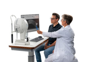 An OD shows a patient images from the Pentacam Cornea OCT